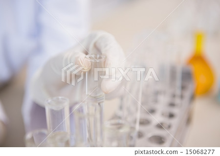 Scientist holding test tube Scientist holding test tube 15068277