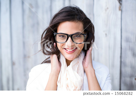 Smiling beautiful brunette looking at camera Smiling beautiful brunette looking at camera 15068282