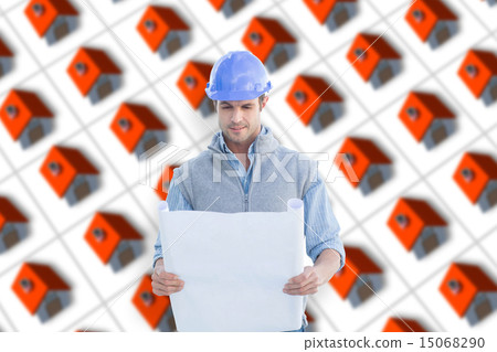Composite image of architect reading blueprints 15068290