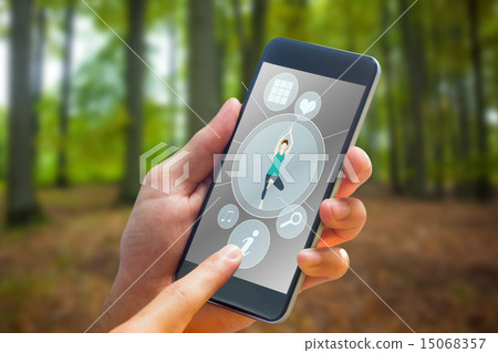 Composite image of hand holding smartphone 15068357