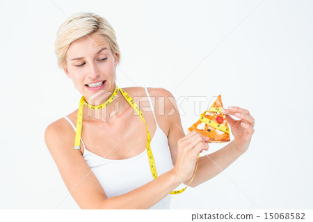 Pretty blonde choosing between eating pizza or not 15068582