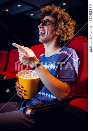 Young man watching a 3d film 15068889