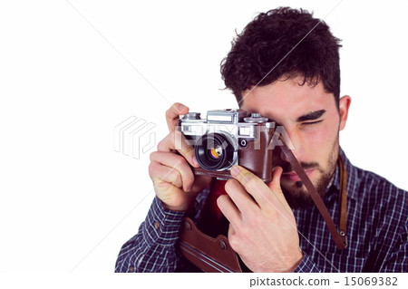 Casual man taking a photo Casual man taking a photo 15069382