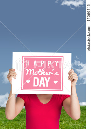 Composite image of woman in pink t-shirt showing card 15069546