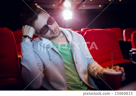 Young man sleeping in chair Young man sleeping in chair 15069815