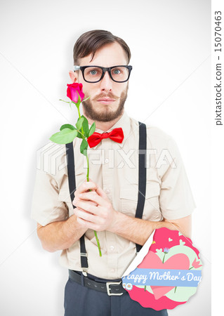 Composite image of geeky hipster offering a rose Composite image of geeky hipster offering a rose 15070463
