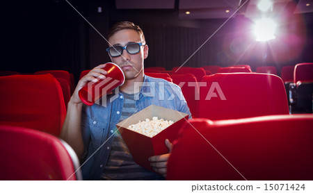 Young man watching a 3d film 15071424
