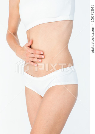 Woman touching her belly 15072043