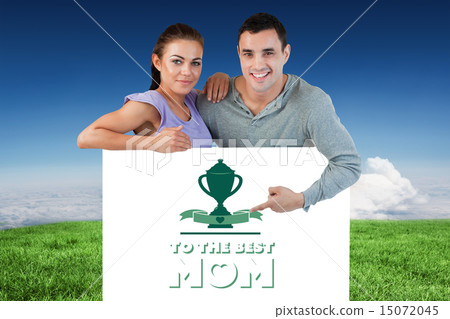 Composite image of young couple presenting advertisement 15072045