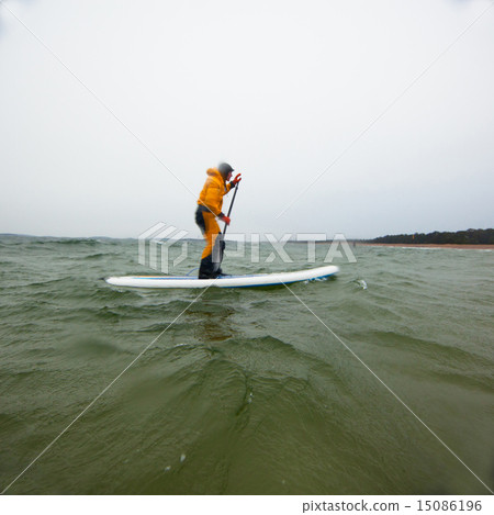 Woman on a stand up paddle 15086196