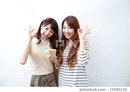 Two young women 15090238