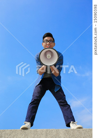 young man shout megaphone 15090398