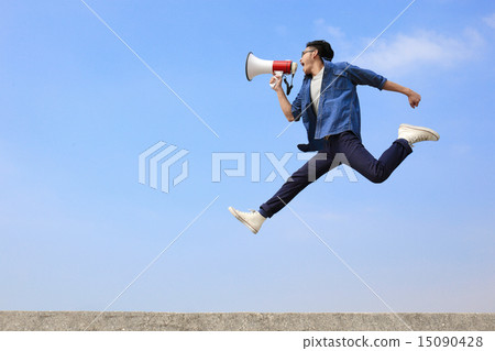 man jump and shout megaphone 15090428