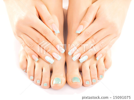 beautiful feet with turquoise pedicure isolated  15091075