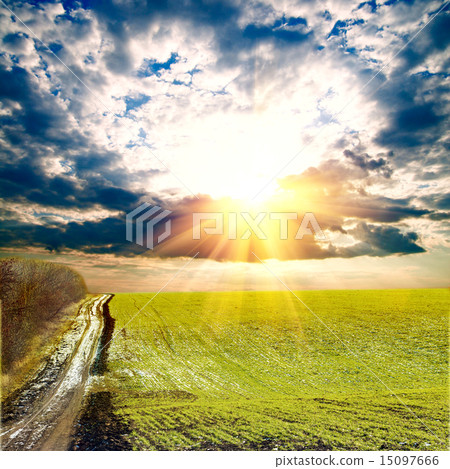 sunrays over green field with path sunrays over green field with path 15097666