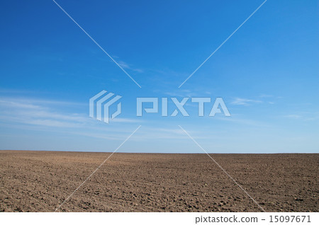 view to black field in spring 15097671