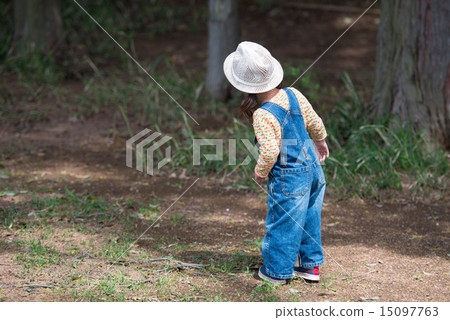 A girl looking into the forest 15097763
