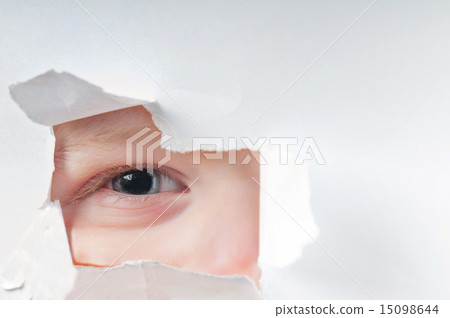 Cute baby boy looking through paper hole Cute baby boy looking through paper hole 15098644