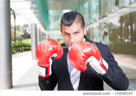 Businessman wear boxing gloves 15099287