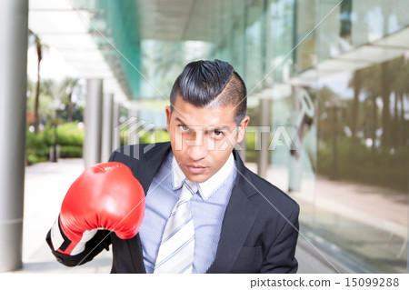 Businessman wear boxing gloves 15099288