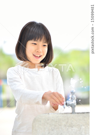 A girl drinking water 15099481