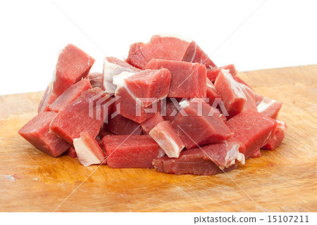 Raw sliced meat on a board 15107211
