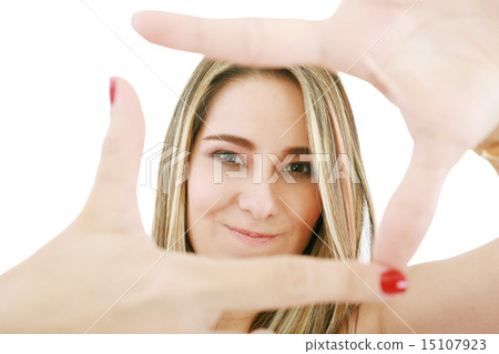 Young attractive woman framing her hands Young attractive woman framing her hands 15107923