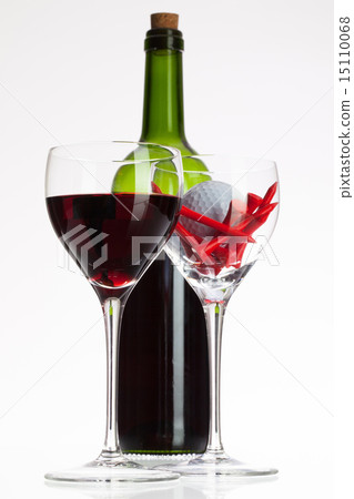 Wine glasses with red wine and golf ball Wine glasses with red wine and golf ball 15110068