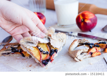 pieces of biscuits with peach and blueberry pieces of biscuits with peach and blueberry 15110411