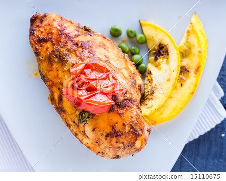 whole chicken fillet baked in a spicy sauce 15110675