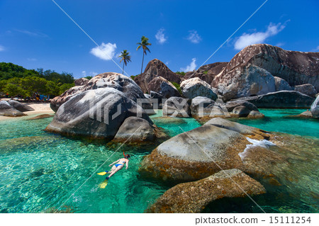 Woman snorkeling at tropical water Woman snorkeling at tropical water 15111254