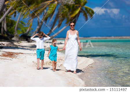 Mother and kids on a tropical vacation 15111497