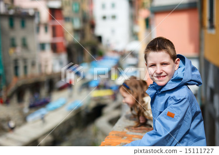Kids in Riomaggiore village in Cinque Terre 15111727