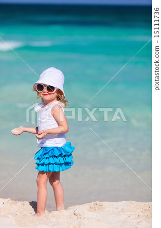 Adorable little girl at beach 15111736