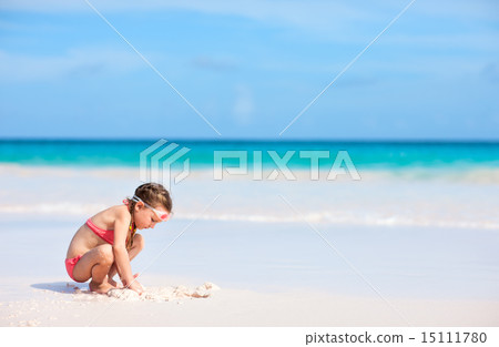 Adorable little girl at beach Adorable little girl at beach 15111780