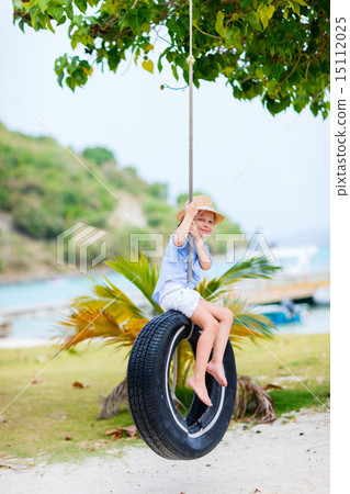 Little girl on tire swing Little girl on tire swing 15112025