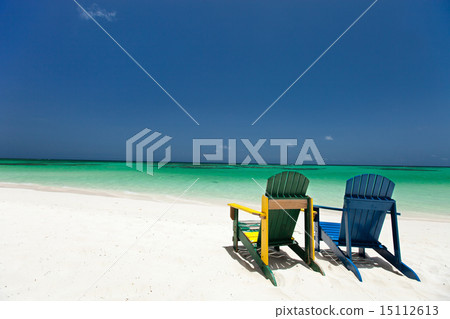 Colorful lounge chairs at Caribbean beach 15112613