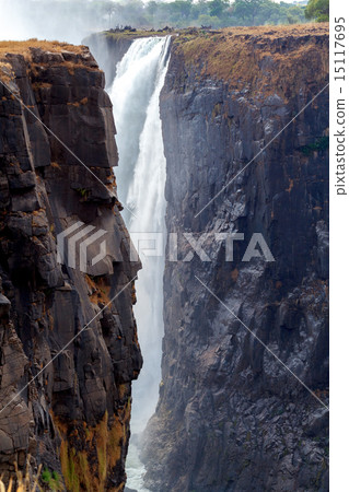 The Victoria falls with mist from water 15117695