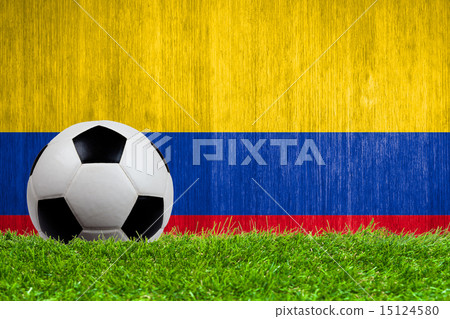Soccer ball on grass with Colombia flag background Soccer ball on grass with Colombia flag background 15124580