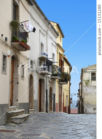 The narrow street between the houses, Italy 15131280