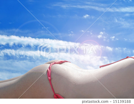 Woman sexy buttocks in red bikini against blue and sun. Woman sexy buttocks in red bikini against blue and sun. 15139188