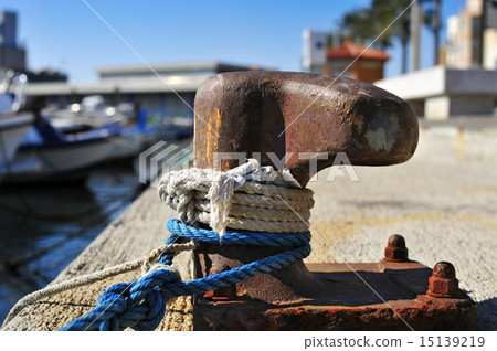 ropes tied on a rusty mooring 15139219