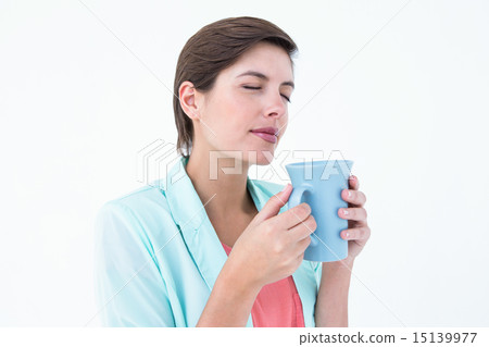 Pretty brunette drinking coffee 15139977