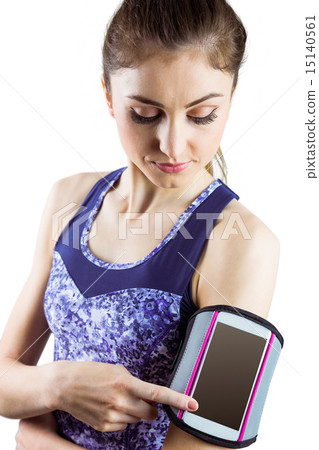 Fit woman using smartphone in armband Fit woman using smartphone in armband 15140561