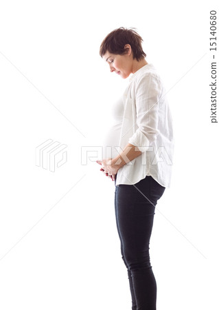 Pregnant woman holding her bump 15140680