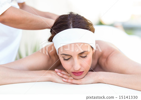 Calm woman receiving reiki treatment 15141330