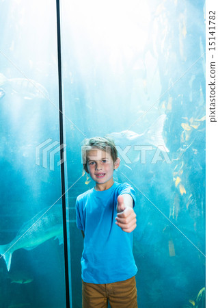 Happy young boys rising his finger Happy young boys rising his finger 15141782