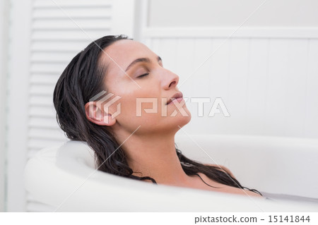 Pretty brunette taking a bath Pretty brunette taking a bath 15141844