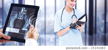 Composite image of man using tablet pc Composite image of man using tablet pc 15141983