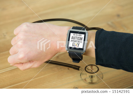 Composite image of businesswoman with smart watch on wrist Composite image of businesswoman with smart watch on wrist 15142591